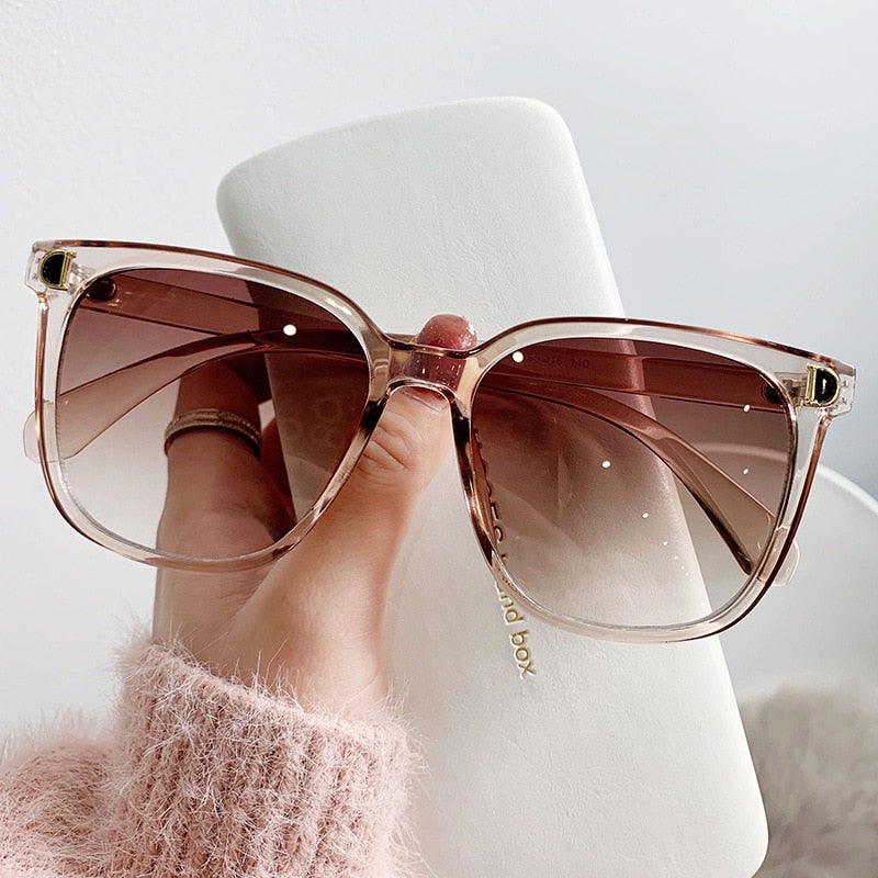 Luxury Lagoon Sunnies Sunset and Swim Brown