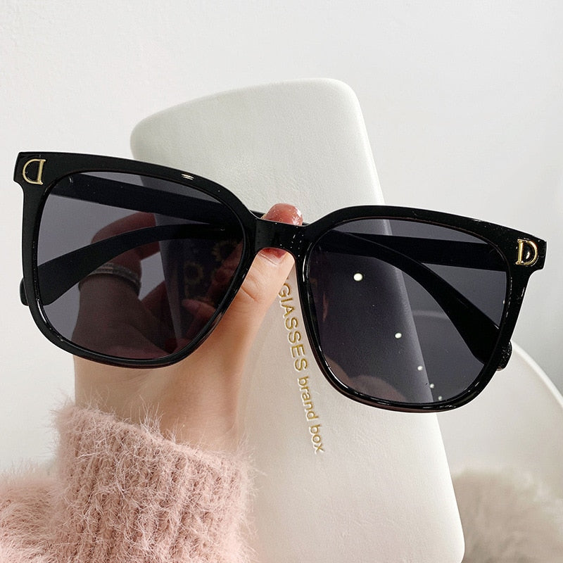 Luxury Lagoon Sunnies Sunset and Swim Black Gray