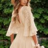 58b65b08-11c0-4d09-8854-642fd51691f8-Max.jpg Spirit and Rebel Lace Cutout Half Sleeve Mini Boho Dress