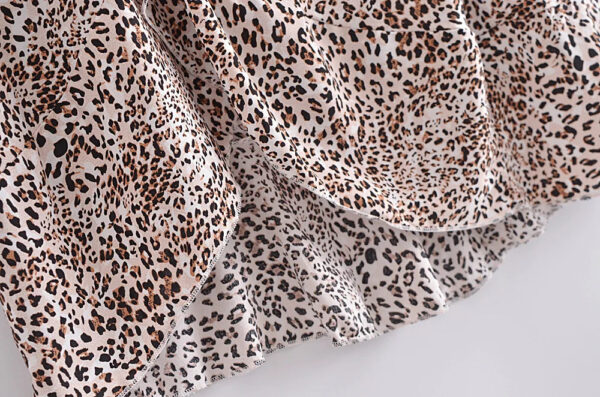 H178519ff686440ed9be2e10af6b0edbfY.jpg Wild Instincts Wrap Skirt with Leopard Ruffle Hem