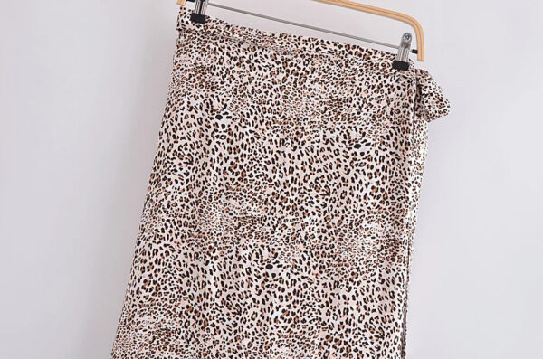 H48ca370fc4ad4a9094df7aee0f9041e5t.jpg Wild Instincts Wrap Skirt with Leopard Ruffle Hem