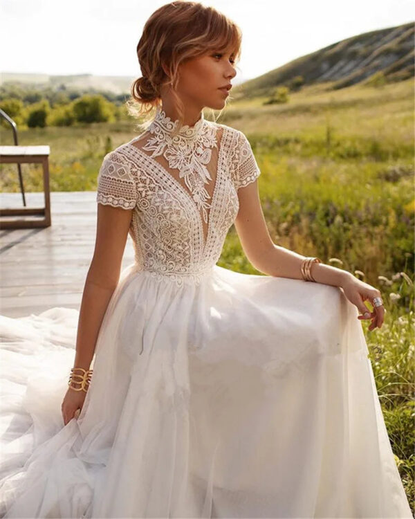H4ec9f40130954af695a9b184a5b50bdbG.jpg Whispering Lace High Neck Boho Wedding Dress