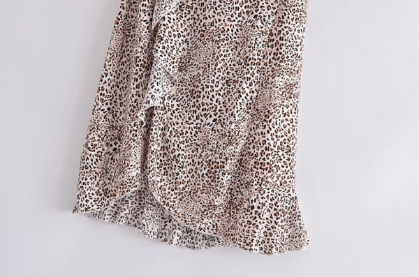 H590ef5ff95c341438e5b763bf10dfb48a.jpg Wild Instincts Wrap Skirt with Leopard Ruffle Hem