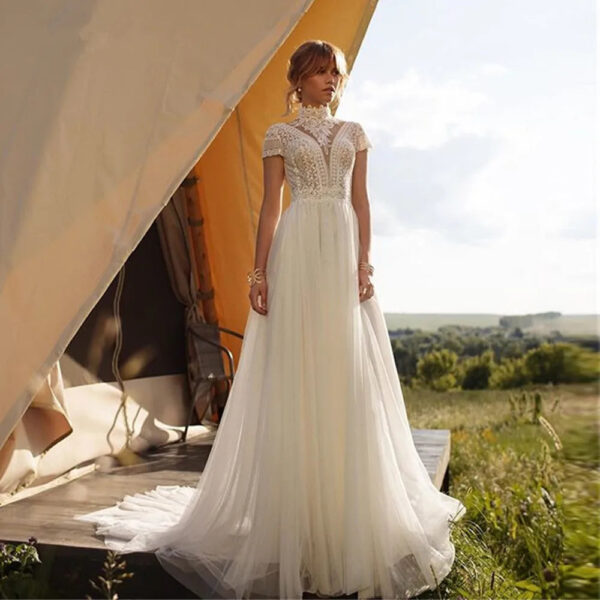 H70989d779c11492cacc426f486385e40v.jpg Whispering Lace High Neck Boho Wedding Dress