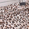 H8c9877d4d6cd4702a83f1740f320fc4dm.jpg Wild Instincts Wrap Skirt with Leopard Ruffle Hem