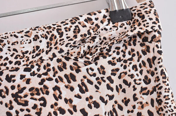 H8c9877d4d6cd4702a83f1740f320fc4dm.jpg Wild Instincts Wrap Skirt with Leopard Ruffle Hem