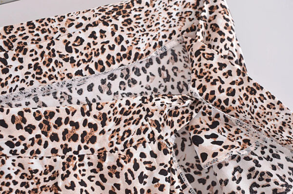 Hc84a5ffd18de47b782aeaff3167ff2b4x.jpg Wild Instincts Wrap Skirt with Leopard Ruffle Hem