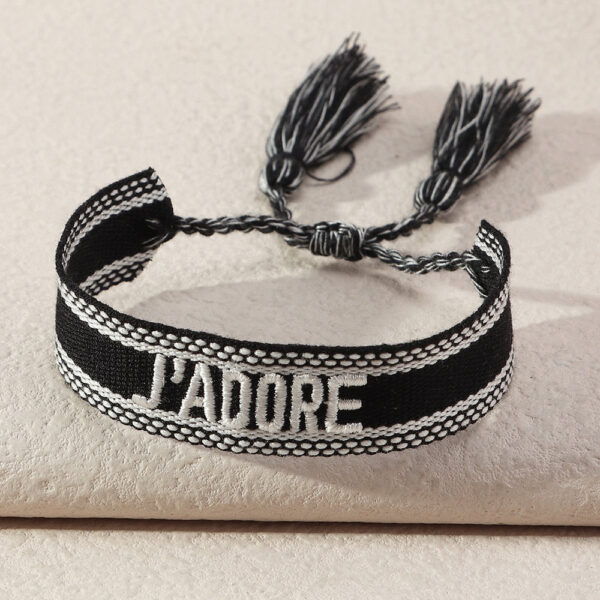 S0561f06a0af4471b8d3f4d705b501f26m.jpg Embroidered Boho Tassel Bracelet