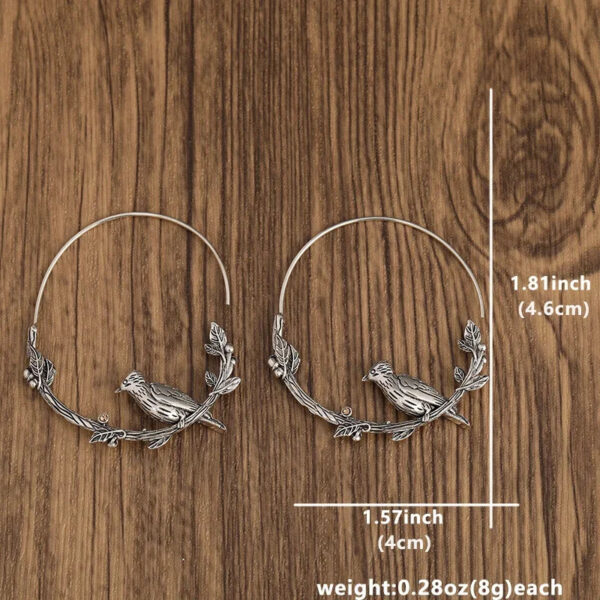 S0b48fc14979a4b348a0ba3b3e5557f1ak.jpg Mystic Raven Vintage Crow Hoop Boho Earrings