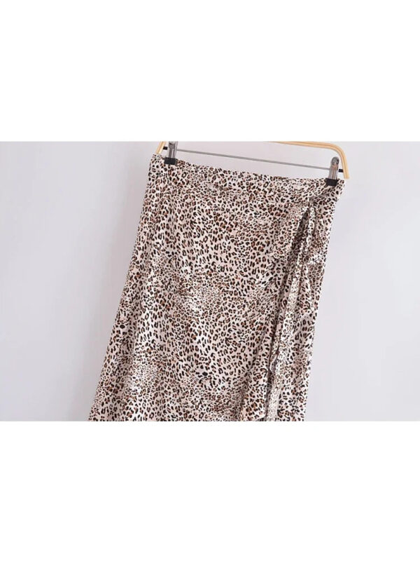 S0b77d475a683465fb7cbffdc075d1c17k.jpg Wild Instincts Wrap Skirt with Leopard Ruffle Hem