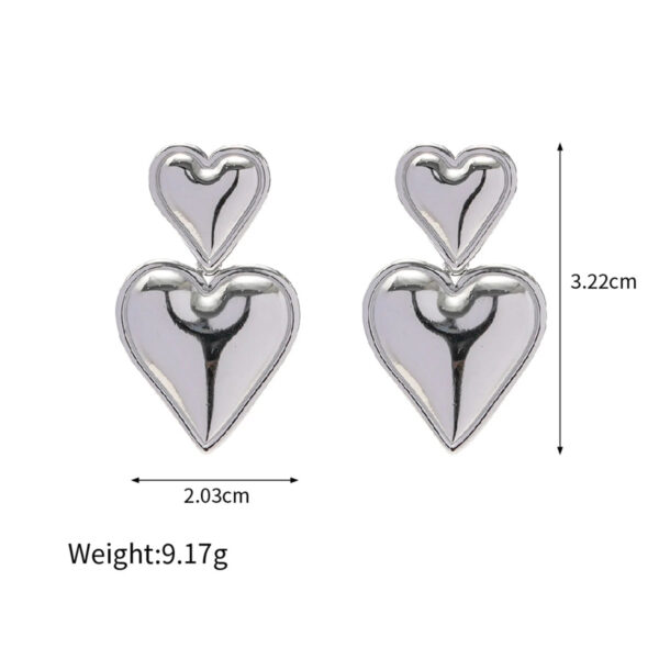 S1319bb1c7d334c198e4fab3ba83ae33cB.jpg Twilight Charm Heart Dangle Earrings in Metallic Finish