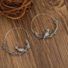 S2bb302dc1d5a43d9869731f206ed6bb6k.jpg Mystic Raven Vintage Crow Hoop Boho Earrings