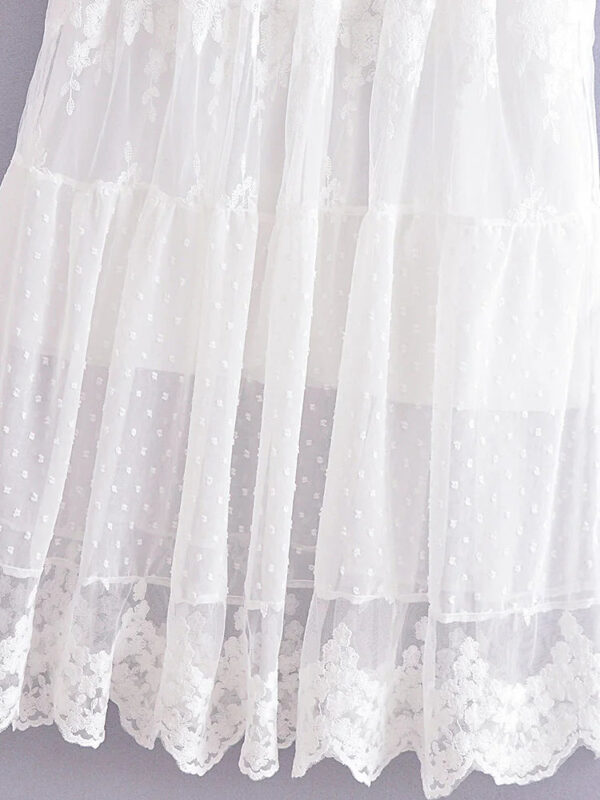 S383d1f682ae649f5b0afd45b7dd29adf7.jpg The Tide Gown — Floaty Lace Beach Wedding Dress