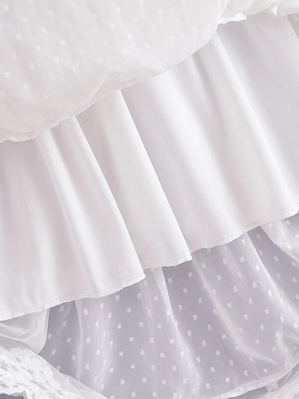 S4c8d70bbe3294fc6aad549da807d6f0fL.jpg The Tide Gown — Floaty Lace Beach Wedding Dress