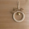 S739ea197c03447abaf0139b2c30738ffX.jpg Rustic Harmony Bell Bohemian Wall Decor with Braided Pattern