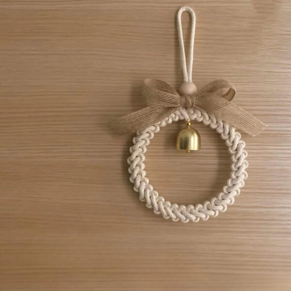 S739ea197c03447abaf0139b2c30738ffX.jpg Rustic Harmony Bell Bohemian Wall Decor with Braided Pattern