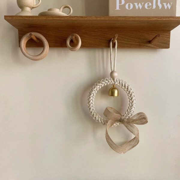 S7de29c69cffa4b92b7812aba334977dff.jpg Rustic Harmony Bell Bohemian Wall Decor with Braided Pattern