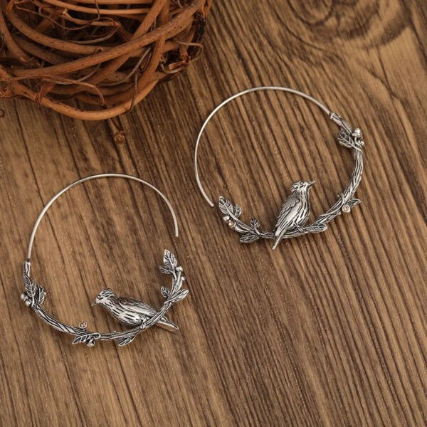 S8994e4a6264a43cc9c9045f99065b3a4c.jpg Mystic Raven Vintage Crow Hoop Boho Earrings