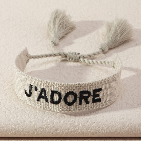 S8e52dfa4257e455e8237b834f4a2cbe8m.jpg Embroidered Boho Tassel Bracelet