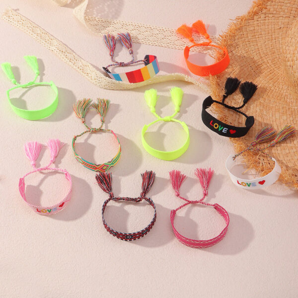 S95058584ec404a82a9cf1f6805db9c70T.jpg Embroidered Boho Tassel Bracelet