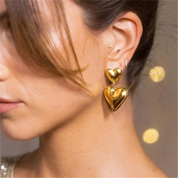 Sad172f9ce0d74317a06f54b17024e2bcF.jpg Twilight Charm Heart Dangle Earrings in Metallic Finish