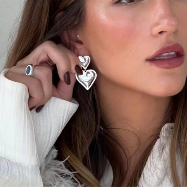 Sb348cf09bcbb46f087069ddef12048169.jpg Twilight Charm Heart Dangle Earrings in Metallic Finish