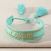 Scf7f22244f26495394a4b0c3a6d548e7P.jpg Embroidered Boho Tassel Bracelet