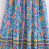 Bohemian Maxi Dress with Vibrant Floral Print and Flowing Silhouette