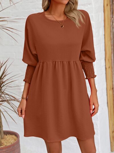 faa67f5b-e4b9-4c18-af64-bf36a8cf933f-Min_7333e3ec-e082-4ce6-9162-cddcb17871ca.jpg Round Neck Lantern Sleeve Mini Dress