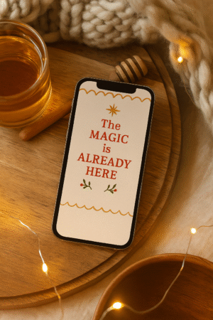 20251118_2356_Cozy Tea Setup_remix_01kacfc48ket6bzt0q8cjte5ex Christmas Phone Wallpaper – “The Magic Is Already Here” Embroidered Quote