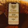 20251119_0007_Cozy Quilt Wallpaper_remix_01kacfz69kfgfb4a4x2d440pk5 Christmas Quote Phone Wallpaper – “Cozy Moments Are Enough”