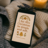 20251119_0024_Cozy Holiday Atmosphere_remix_01kacgy6fsf93sd22c5xh5c16p Christmas Quote Phone Wallpaper – “I Let This Christmas Be Simple and Soft”