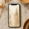 20251119_0236_Cozy Winter Wallpaper_remix_01kacrh8npfb29f55x4zmwdsah Winter Forest Phone Wallpaper – Cozy Lantern Snow Scene