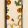 20251202_0842_Phone Wallpaper Mockup_remix_01kbewndnfe3ssxzpkr2qegjw5 Warm Citrus & Pine Flatlay – Aesthetic Christmas Phone Wallpaper