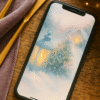 20251203_0924_Cozy Winter Wonderland_remix_01kbhheqc7enfts9p588ms0rsw Soft Glow Cottage Lantern – Christmas Phone Wallpaper