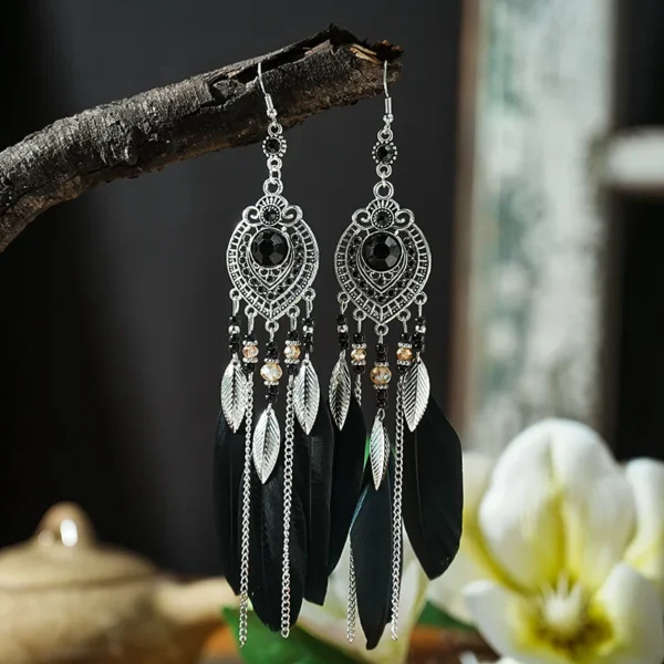 S99cdbea905e6445aa595a6c7ff108b848.webp Boho Feather Earrings with Vibrant Gemstone Accents