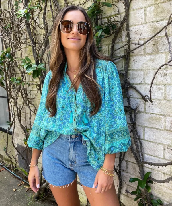 H0bfbc603db0d447ca4f84973e058ec66R.webp Rhapsody Button-Down Boho Floral Blouse with Tassel Ties