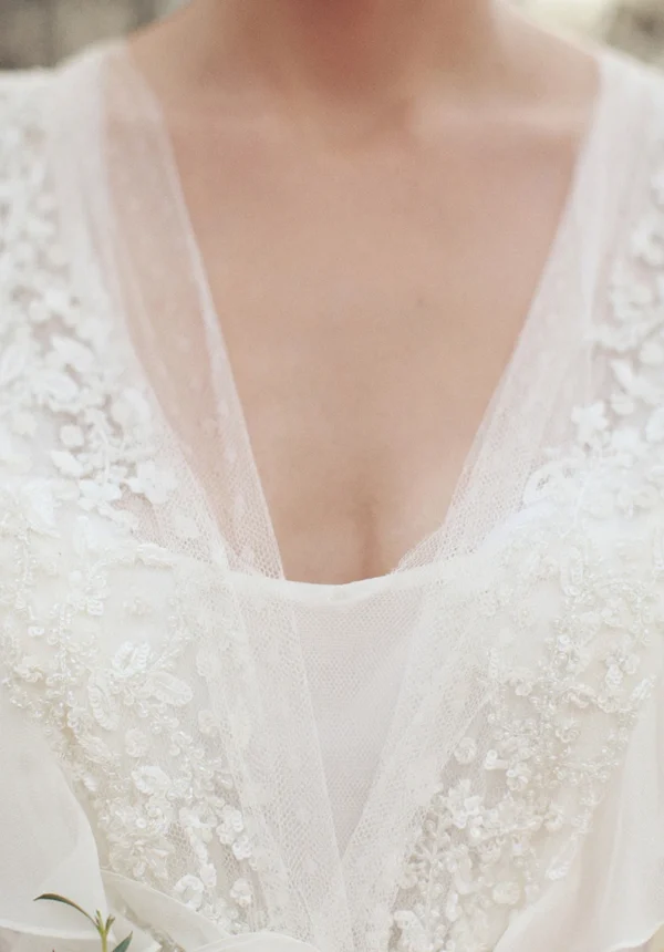 H19a3bdafe3144577a049a73f2cfe4731F.webp The Olivette Gown — Beaded Chiffon Boho Wedding Dress with Flutter Sleeves Cream White – Spirit & Rebel