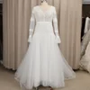H45ff3f7c9a4644ed8e9bbb95f92f2fb11.webp Celestial Sands Long Sleeve Lace Gown