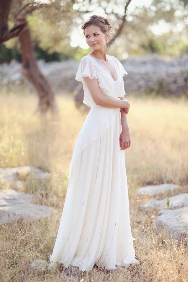 H4d4df8eadd4e42949520b67b1530ad27f.webp The Olivette Gown — Beaded Chiffon Boho Wedding Dress with Flutter Sleeves Cream White – Spirit & Rebel