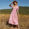 H50a27bc70a0f4dd0ab062522ec8088d6Y.webp Boho-Chic Ditsy Floral Tiered Maxi Dress with Ruffle Puff Sleeves