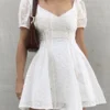 H50cd3f67b1c34ca099b4bba33b44a72a8.webp Sunkissed Embroidered White Dress with Corset Lacing