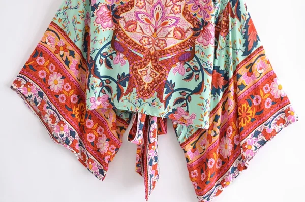 H5cf4cea64fc14746ad974999dada3a66T.webp Adventure Awaits Batwing Boho Kimono with Ties and Vibrant Patterns