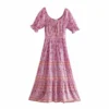 H934259f76a084ecb9328b28a3d981541c.webp Boho-Chic Ditsy Floral Tiered Maxi Dress with Ruffle Puff Sleeves
