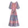 Hd8f4e2cf655d4391acf020f7501bcae9C.webp Wanderlust Tie-Neck Floral Peasant Maxi Dress