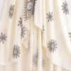 S00dd08e5f0644fbb915846299cd685dd6.webp Desert Bloom: Floral Print Backless Halter Maxi with Tassel Hem