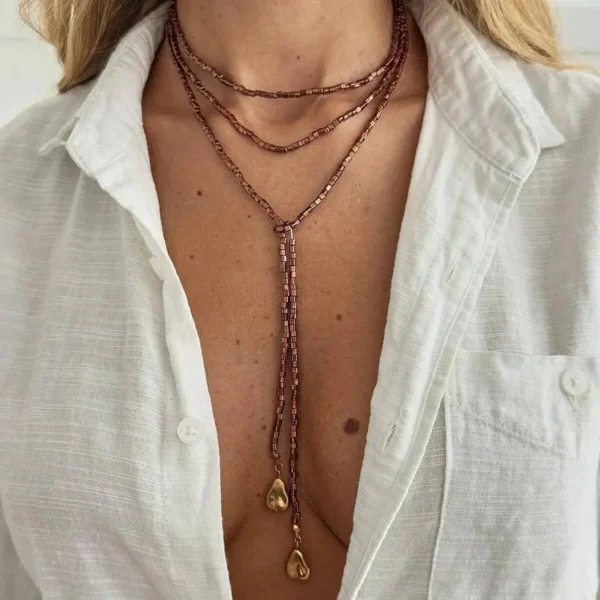 S0250f954326e4867bf42035f4da7320fj.webp Ethereal Echoes Layered Beaded Necklace with Adjustable Length
