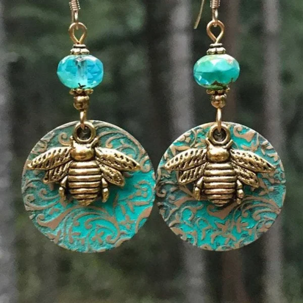 S02984f08443742a581054bb43b9bdbf5S.webp Sunlit Garden Boho Earrings with Floral Accents and Textured Discs