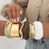 S0763fb20aea147bebc719c5a4c96a8f0L.webp Urban Edge Modern Chunky Bangles Set in Textured Metal and Resin