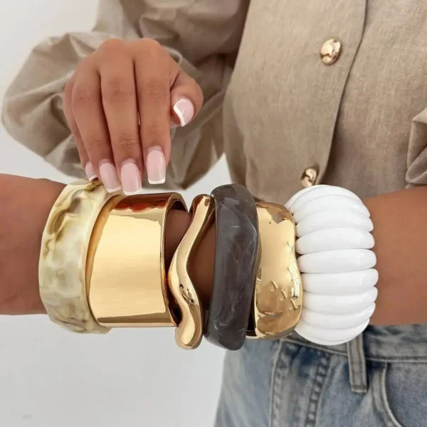 S0763fb20aea147bebc719c5a4c96a8f0L.webp Urban Edge Modern Chunky Bangles Set in Textured Metal and Resin